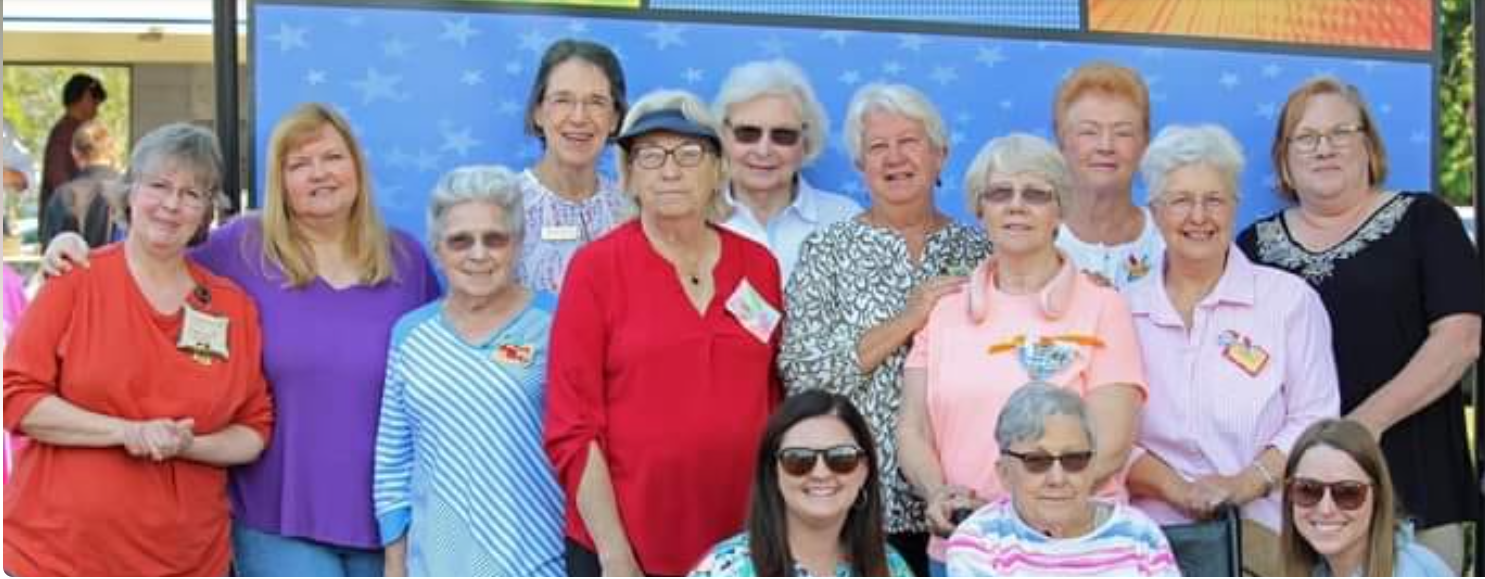 Black and white portrait of artist Laura Patrick, highlighting her background in fine art and design