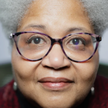 Portrait of local artist and instructor Cindy Inman, known for her vibrant watercolor and acrylic artworks, leading the 'Wacky & Wonderful Art with Cindy' classes at Thomasville Center for the Arts.